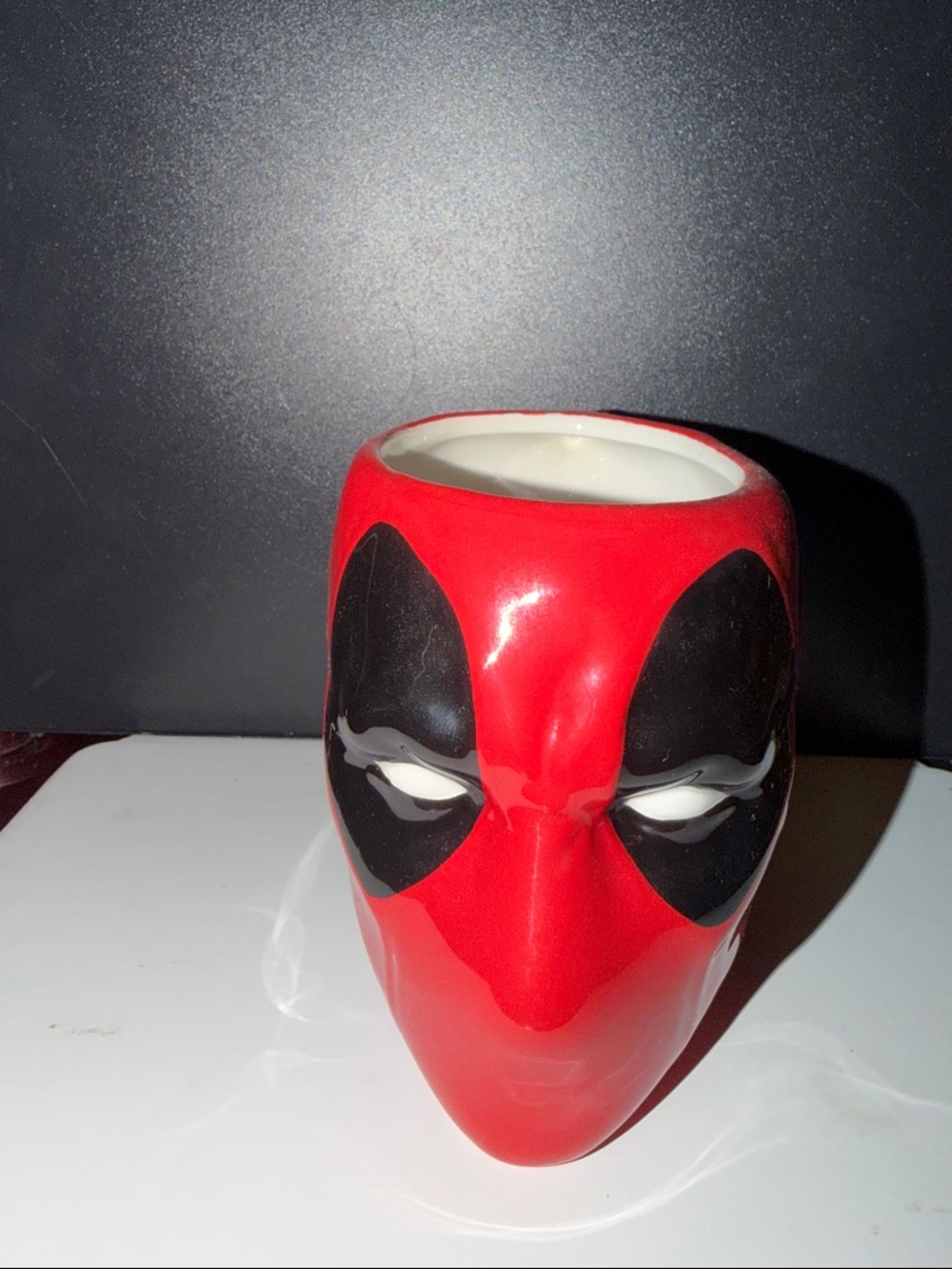 Red and Black Character Face Ceramic Mug
